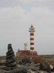 27846 Pillar of rocks and lighthouse Faro de Toston.jpg